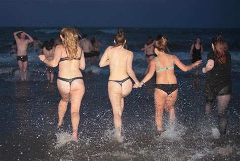 Amateur strip night at woody's part 2. St andrews university students skinny dip as may day sees ...