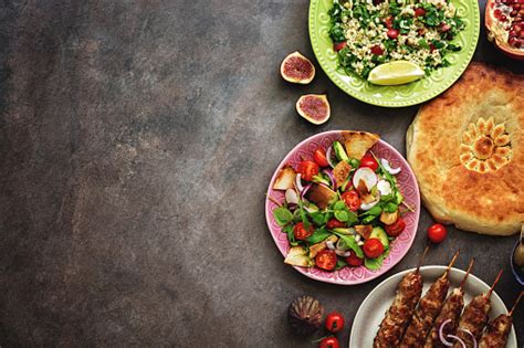 Mediterranean pasta with chopped greens. Arabic And Middle Eastern Dinner Table Meat Kebabtabbouleh ...