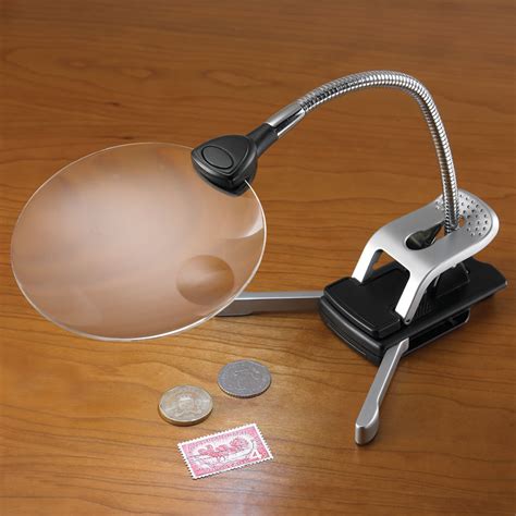 Led light small hand held magnifying glass lens hobbyist magnification magnifier. The Hands Free Illuminating Magnifying Glass - Hammacher ...