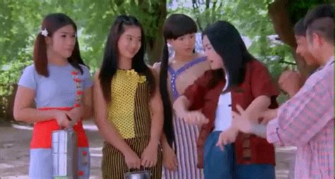 Myanmar woman recording an aerobics workout video while a convoy of military vehicles heads towards the parliament building amid a coup d'état. Dance Flirting GIF - Find & Share on GIPHY