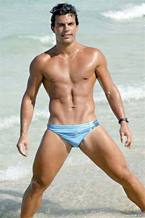 You can unsubscribe at any. Hunk on the beach in a sexy swimsuit has a world class ...