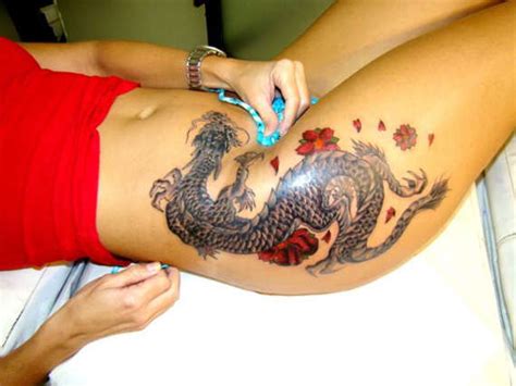 This suits men who having a tat that shows how pretty you look is all a woman could want , and by choosing this. 95 Breathtaking Dragon Tattoos and Designs for You