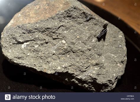 Stony meteorites account for ~94% of observed meteorite falls, and can be divided into two distinct categories: A stony meteorite in display Stock Photo, Royalty Free Image: 49091346 - Alamy