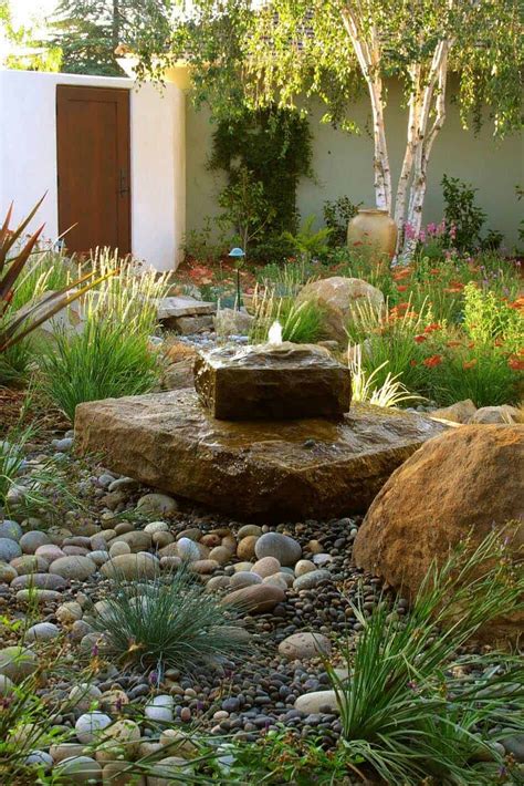 Find landscaping and garden ideas, including water features, fences, gates, flowers and plants. 23 Inspiring outdoor garden fountains to add tranquility to your landscape