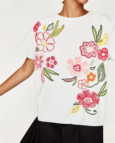 Maybe you would like to learn more about one of these? Image 4 of RUBBERIZED FLORAL PRINT T-SHIRT from Zara ...