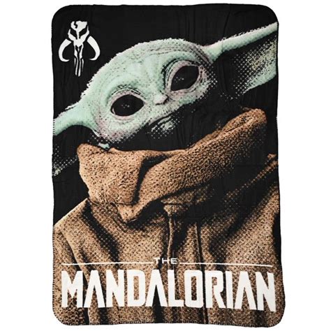 Even better, you can stuff the whole blanket into a plush baby yoda, meaning this blanket doubles as both a throw and a stuffed animal. Star Wars Disney The Mandalorian Throw Blanket 45" x 60 ...