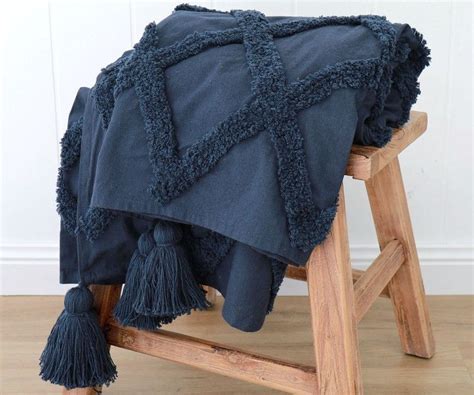 Navy blue got its name from the dark blue (contrasted with naval white) worn by officers in the royal navy since 1748 and subsequently adopted by other navies around the world. Positano Navy Blue Cotton Tufted Throw - Home Decor Online ...