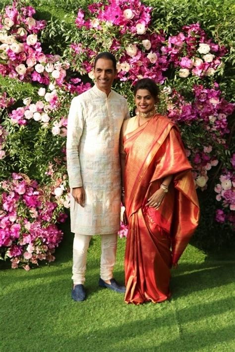 After an extravagant wedding on december 12, isha ambani and anand piramal hosted a reception at isha's uncle anil ambani with wife tina were seen in attendance. Akash Ambani and Shloka Mehta Wedding Reception Photos ...