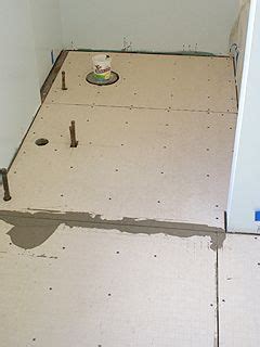 Air gap subfloor panels elevate and insulate your finished floor quickly and easily. Final sheets of Hardibacker fastened to bathroom subfloor. | Cement bathroom