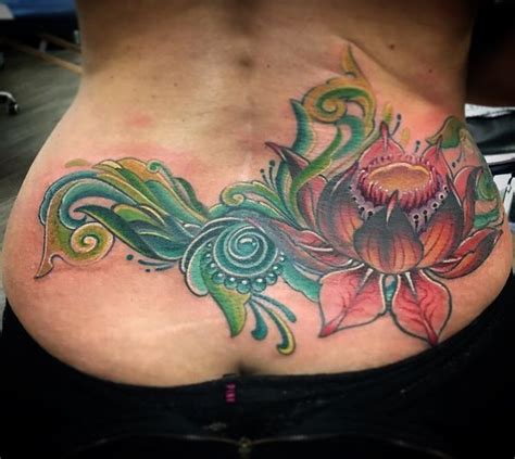 Some tramp stamp designs are tattooed onto the low back area are centered while others span across the entire low back area. Tramp Stamp Tattoos Designs and Meanings (2018)