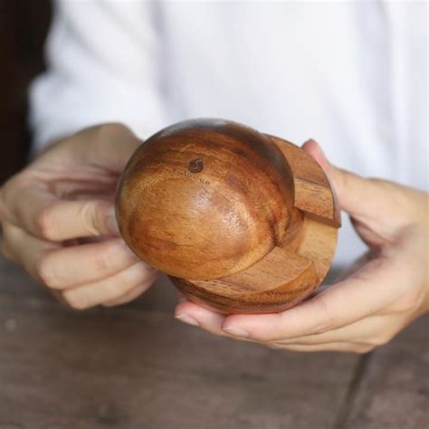 If you start inserting the sphere in and out of the pyramid, it changes colour. Wooden Sphere Puzzle Solution 6 Piece - All About Wooden