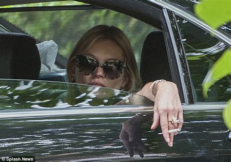 Hit us up if you want to. Glastonbury 2013: Kate Moss latches onto husband Jamie ...