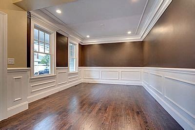 Although subtle, crown molding makes a big statement. Wainscoting, crown molding and large trim moldings give ...