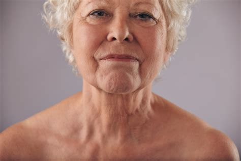 Mature Woman Face With Wrinkled Skin Stock Photo - Download Image Now ...