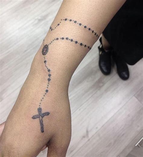 Tattoos on the wrist areas are swiftly becoming popular among young people who prefer having their body piercing uniquely different from thousands of other tattoo wearers with decorations on their. Minimalistic rosary tattoo around wrist 0 # ...