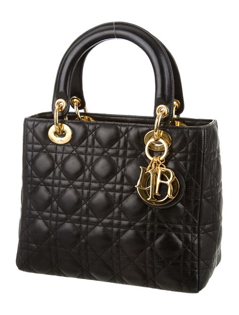 We would like to give you a little the lady dior was first launched in 1994 with no official name, nicknaming it chouchou, which means favorite in french. Christian Dior Vintage Medium Lady Dior Bag - Handbags ...