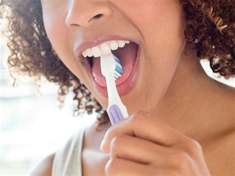 I recommend efferdent soak and a light toothbrush (without paste) to take off build up. How to Clean Your Tongue: Three Proven Methods