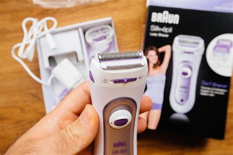 Maybe you would like to learn more about one of these? Man Holding Braun Silk Epil Women Lady Shaver Epilator ...