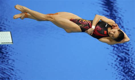 Harper would then execute a wide variety of spins and somersaults on the trampoline to determine the most efficient and effective form for dives off of the 3m springboard. China's Wu Minxia performs a dive during the women's 3m ...
