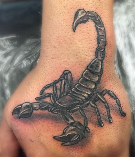 Maybe you would like to learn more about one of these? Scorpion hand piece done at www.creamcitytattoo.com | Scorpio tattoo, Hand tattoos for guys ...