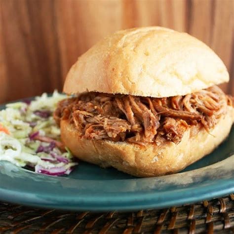 Pour buttermilk over meat and turn to coat on all sides. Paula Deen's Pulled Pork Sandwich | Recipe in 2020 ...