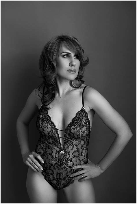 Blond sensual romantic smiling beautiful woman portrait, posing with hands, actress, fashion model, black and white photography. Sweet and Sexy Boudoir Portraits | XO Maggie