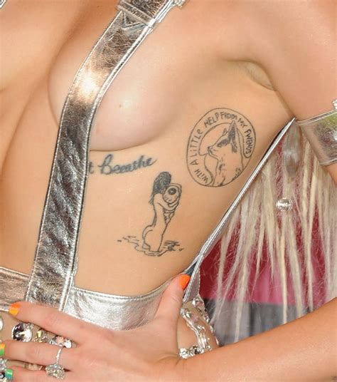 On her right hand alone she has 9 tattoos, though they are all tiny. Miley's first tattoo ever was the phrase "just breathe" on ...