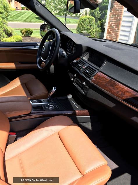 For the 2010 model year the x5 received the new idrive system and the bmw individual audio system along with various other minor updates. 2010 Bmw X5 X Drive 48i Black Sapphire Metallic