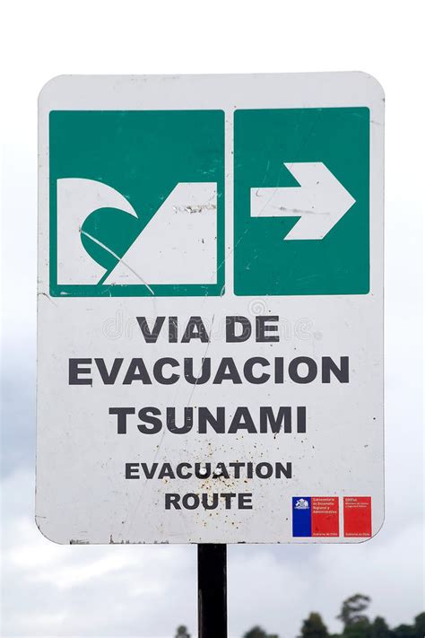 A network of sensors to detect tsunamis and a communications infrastructure to issue timely alarms to. Chilean Tsunami Warning Sign, Chile Editorial Photography ...