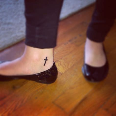 Strikingly beautiful small cross tattoo an image that could be the simplest of all cross tattoos, but may be the most noteworthy of all. Cross tattoo. Inside of ankle | Beauty | Pinterest ...