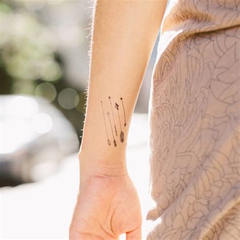 Maybe you would like to learn more about one of these? Five small arrow tattoos on girls wrist - Tattooimages.biz