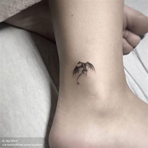 Chinese symbols tattoo on ankle. Dragon tattoo on the ankle. #dragontattoo