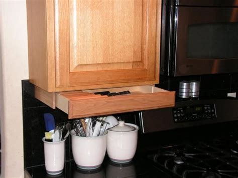 This provides the convenience of having your most used knives at hand in a space saving. under cabinet knife rack | Etsy | Knife storage, Kitchen ...