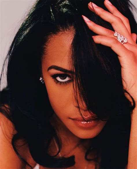 Американская певица, танцовщица, модель и актриса. Aaliyah Photos