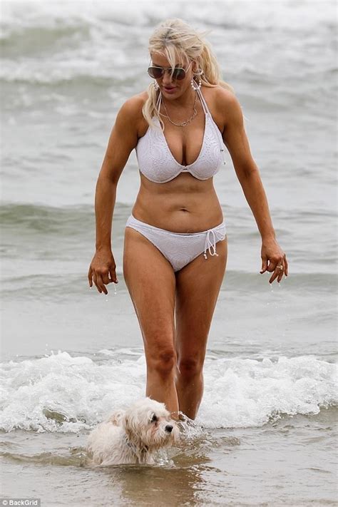 09:14 bst, 11 june 2021. Brynne Edelsten strips down to a bikini at St Kilda Beach ...