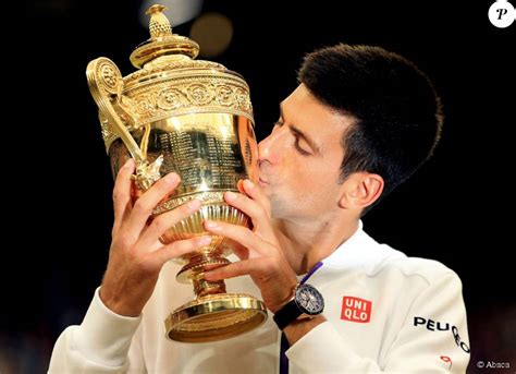 Boris becker auctions off wimbledon trophy jewellery and. Novak Djokovic lifts the Wimbledon Trophy as he celebrates ...