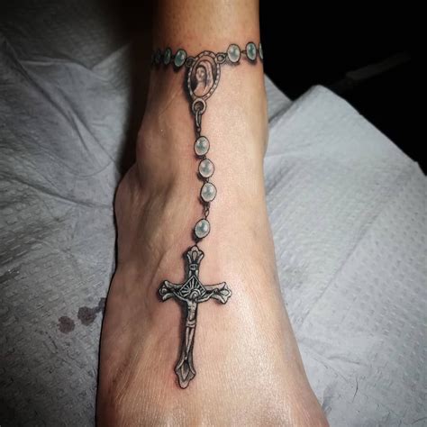 We're used to seeing sketches on paper, but this function of fine art uses peel every bit the canvas. Rosary Anklet Tattoo in 2020 (With images) | Anklet ...