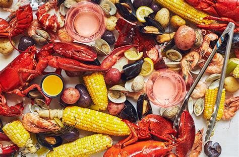 Deep fried balls of clam with a squeeze of lemon juice and some tartar sauce to dip in. How to Prepare a Classic American Clambake | Clam bake ...