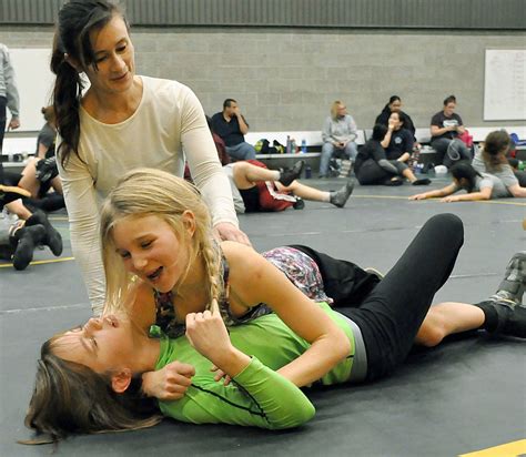 Muscle tussle: local girls get a grip on wrestling at camp | Auburn