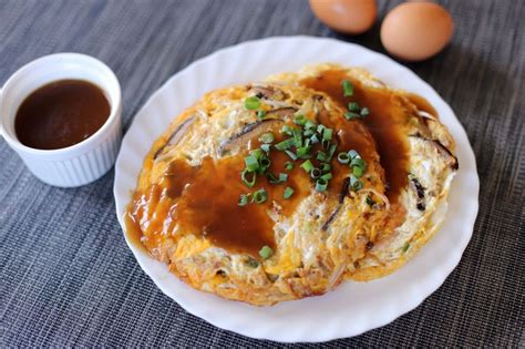 In elaine's egg foo young, homemade char siu, green onion, bean sprouts and shiitake mushrooms are used. This Asian #omelette is better than your usual omelettes ...