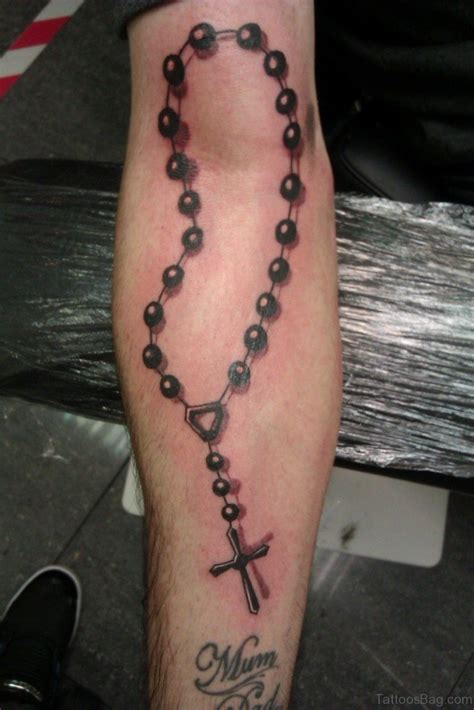 This design style seems to be very popular with women. 52 Great Rosary Tattoos On Arm