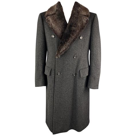 Classical tailored coat with wide, overlapping front flaps with genuine horn buttons, detachable fur collar and functional cuffs. PAUL STUART Size L Charcoal Camel Hair / Wool Double ...