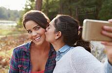 lesbian kiss couple selfie countryside take stock