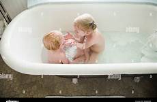 bath sister bathing siblings baby girl stock together washing alamy young bathtub