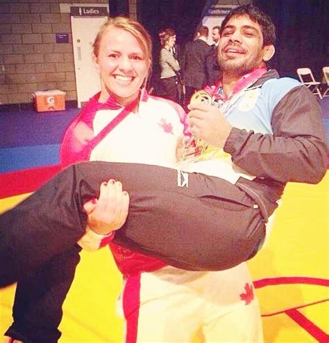 He was competing in the 66 kg weight division when he won the 2010 world title. CWG PHOTOS: Female athlete lifts Sushil Kumar! - Rediff Sports