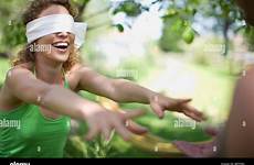 blindfolded alamy stock husband wife woman