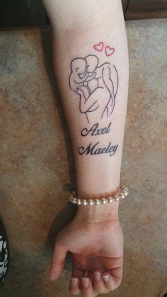 Tattoo of mother and child. 11 Tattoos For Moms Who Aren't Afraid To Show Some Ink ...
