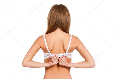 Check spelling or type a new query. Young woman taking off her bra — Stock Photo © mast3r #9112475