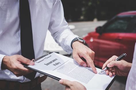 How insurance companies use clue reports. Insurance Agent Examine Damaged Car And Customer Filing Signature On Report Claim Form Process ...