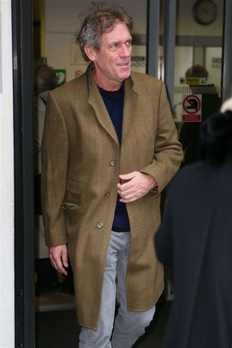 Hugh laurie cuts disheveled figure with uncombed hair and. Hugh Laurie cuts disheveled figure with uncombed hair and ...